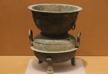 古代人在没有铁锅之前,他们是拿什么来做饭的?