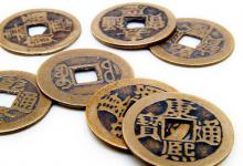 古代钱币为什么中间还有方孔?