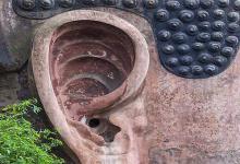 乐山大佛的发髻除了装饰还有什么作用?